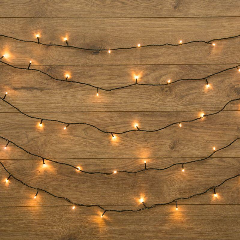 гирлянда светодиодная "твинкл лайт" 10м 80led тепл. бел. 5.7вт 220-240в ip20 с контроллером 8 режимов провод пвх темн. зел. neon-night 303-046 от магазина Штепсель и батарейка.