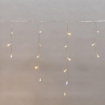 гирлянда светодиодная "айсикл" (бахрома) 5х0.6м 112led тепл. бел. 3.4вт 230в ip44 эффект мерцания провод прозр. neon-night 255-526 от магазина Штепсель и батарейка.