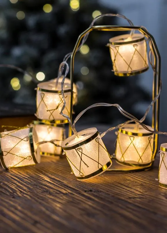 гирлянда светодиодная "барабаны" pvc 5х4см 10led тепл. бел. 1.8+0.3м космос koc_gir-b117 от магазина Штепсель и батарейка.